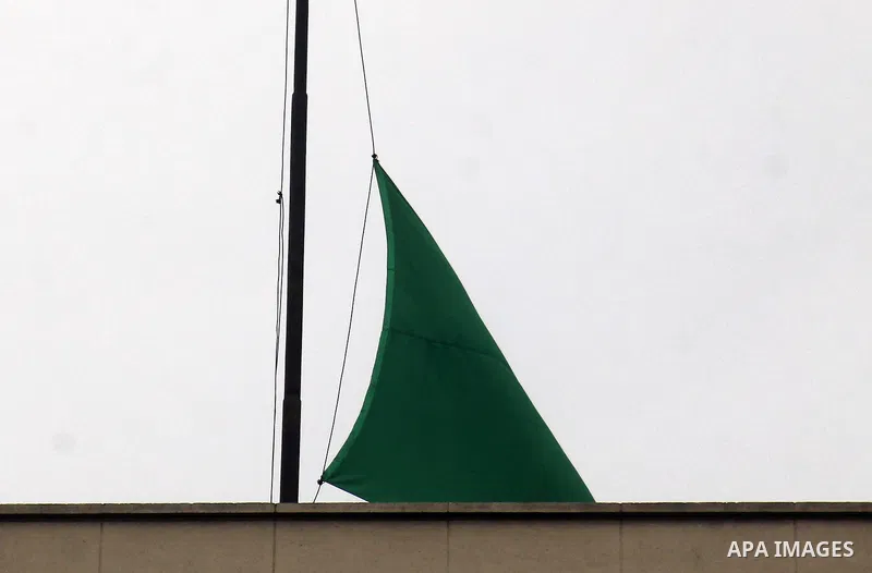The national flag of Saudi Arabia flies at half mast at the Arab League headquarters to mourn the King of Saudi Arabia Abdullah bin Abdul Aziz, in Cairo on January 23, 2015. Saudi Arabia's elderly King Abdullah died on J...