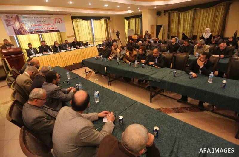 Members of Palestinian factions attend a meting in Gaza city, on January 24, 2015. Photo by Mohammed Asad