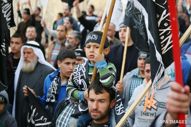 Palestinian supporters of the Islamists Tahrir Party (Liberation Party), take part during a rally in the West Bank city of Hebron, on January 24, 2015, against the printing of satirical sketches of the Prophet Mohammed b...