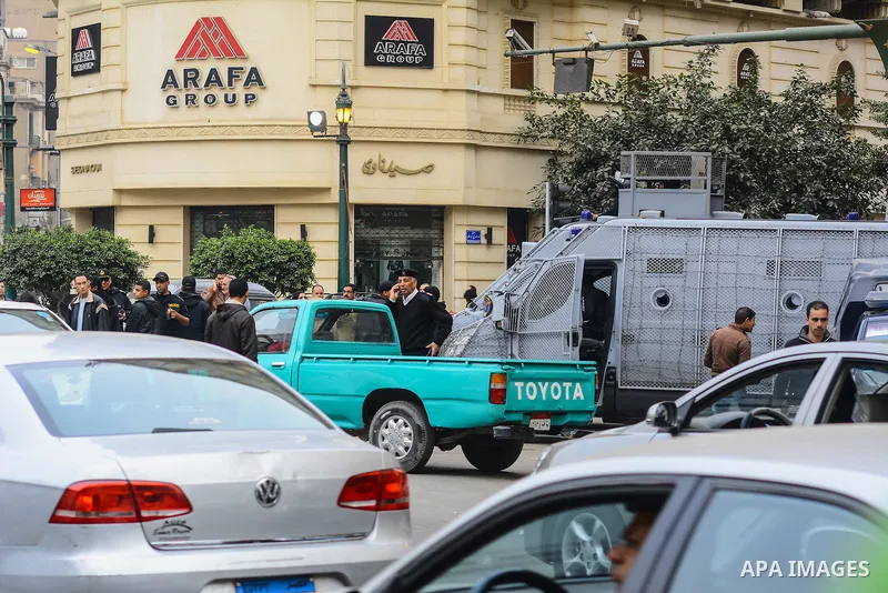 Egyptian policemen detain supporters of the People's Alliance Party during a protest by the party in Cairo, Egypt 24 January 2015. Sabbagh was shot dead with birdshot in central Cairo on Saturday, security sources said,...