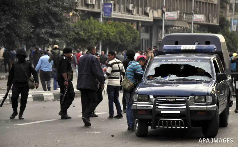 Egyptian security forces stand guard in downtown Cairo, Egypt, Sunday, Jan. 25, 2015. Egypt tightened security in Cairo and other cities Sunday as police moved to break up scattered protests marking the anniversary of th...