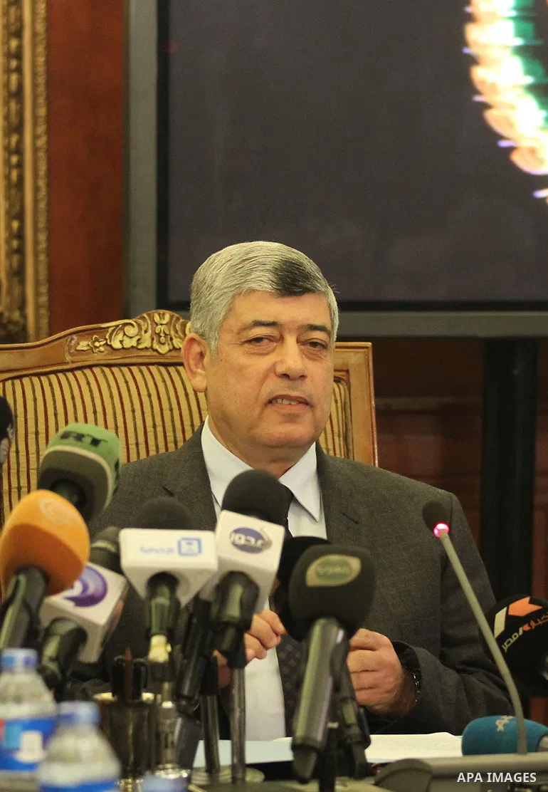 Egypt's Interior Minister Mohammed Ibrahim speaks during a press conference in Cairo, January 26, 2015. Ibrahim offered his condolences to 32-year-old Shaimaa el-Sabagh's family during a news conference carried live on m...