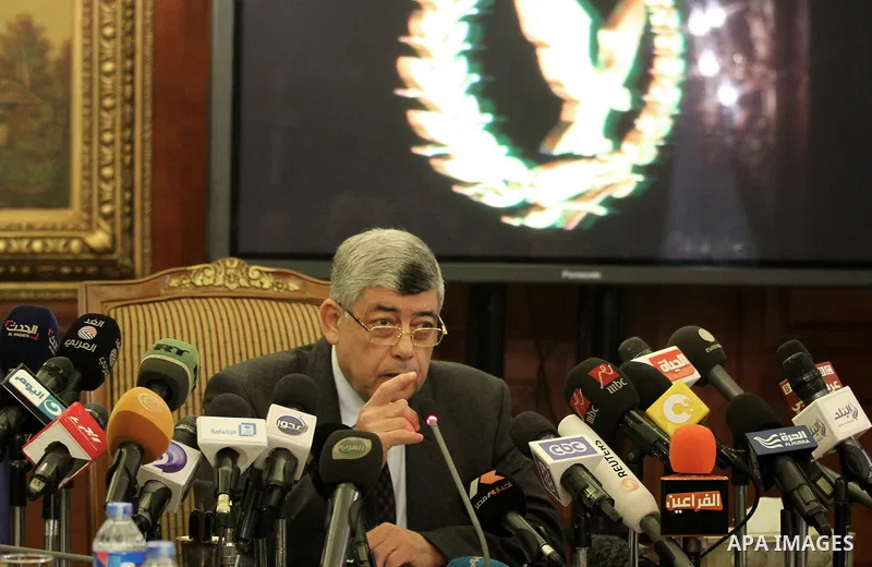 Egypt's Interior Minister Mohammed Ibrahim speaks during a press conference in Cairo, January 26, 2015. Ibrahim offered his condolences to 32-year-old Shaimaa el-Sabagh's family during a news conference carried live on m...