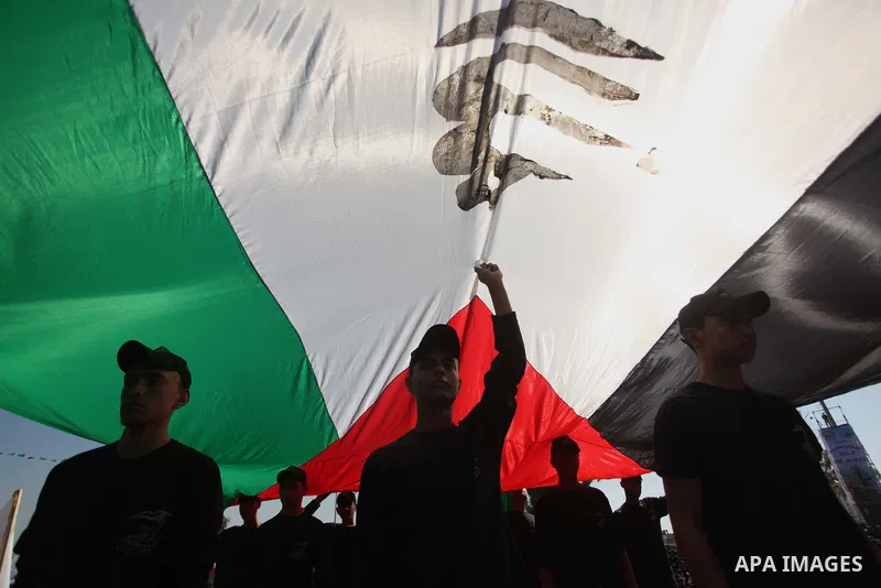 Palestinian youths demonstrate their skills during a graduation ceremony of a military-style camp organized by the Hamas movement in Gaza City on January 29, 2015. Hamas's armed wing organized "Liberation Youths Camps" f...