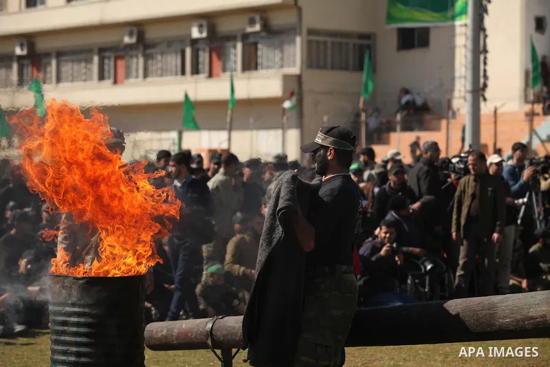 Palestinian youths demonstrate their skills during a graduation ceremony of a military-style camp organized by the Hamas movement in Gaza City on January 29, 2015. Hamas's armed wing organized "Liberation Youths Camps" f...