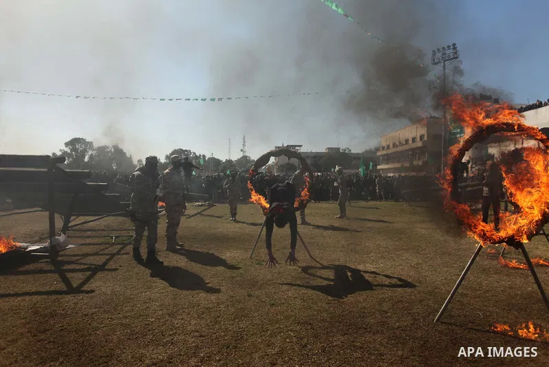 Palestinian youths demonstrate their skills during a graduation ceremony of a military-style camp organized by the Hamas movement in Gaza City on January 29, 2015. Hamas's armed wing organized "Liberation Youths Camps" f...