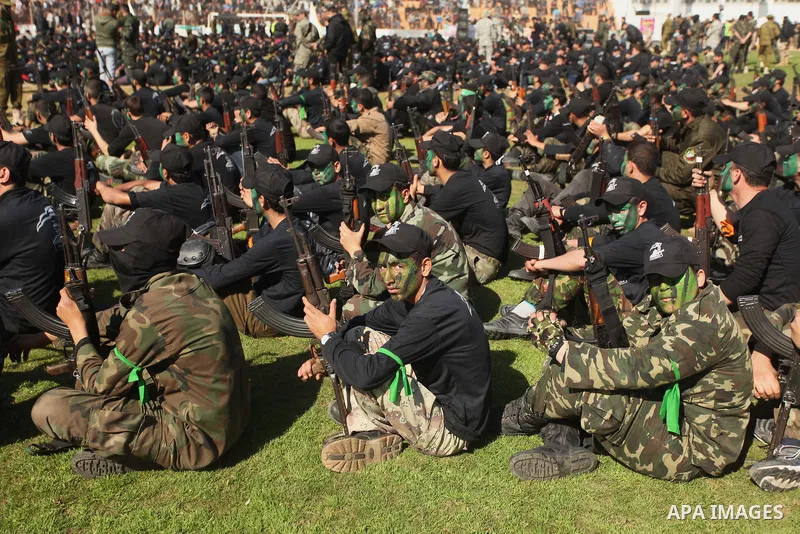 Palestinian youths demonstrate their skills during a graduation ceremony of a military-style camp organized by the Hamas movement in Gaza City on January 29, 2015. Hamas's armed wing organized "Liberation Youths Camps" f...
