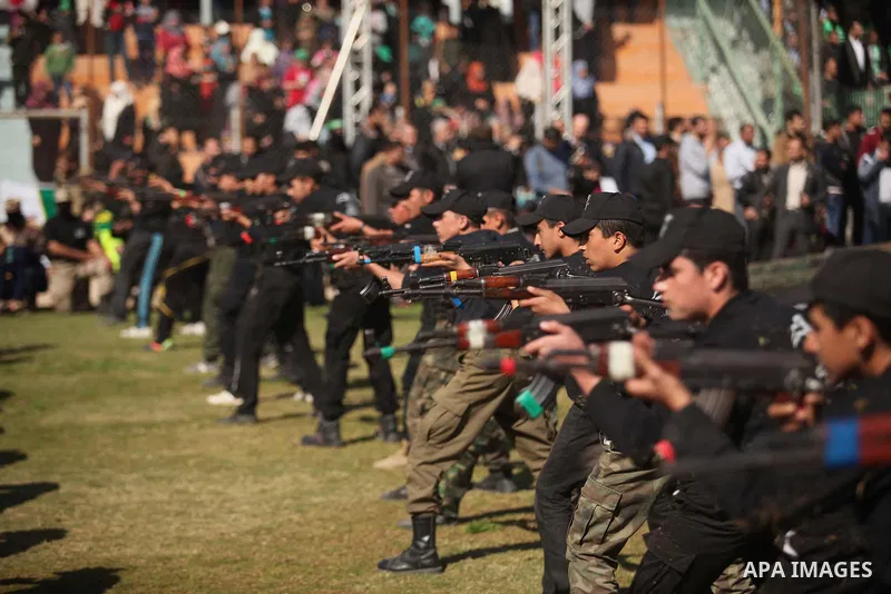Palestinian youths demonstrate their skills during a graduation ceremony of a military-style camp organized by the Hamas movement in Gaza City on January 29, 2015. Hamas's armed wing organized "Liberation Youths Camps" f...