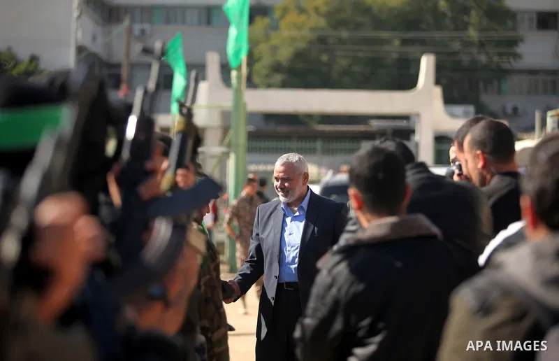 Senior Hamas leader Ismail Haniyeh attends a graduation ceremony of a military-style camp organized by his movement in Gaza City on January 29, 2015. Hamas's armed wing organized "Liberation Youths Camps" for young Pales...