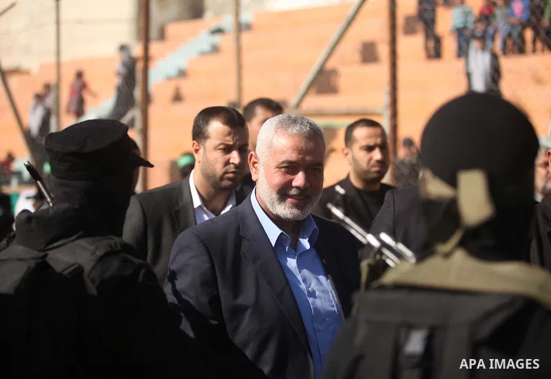 Senior Hamas leader Ismail Haniyeh attends a graduation ceremony of a military-style camp organized by his movement in Gaza City on January 29, 2015. Hamas's armed wing organized "Liberation Youths Camps" for young Pales...
