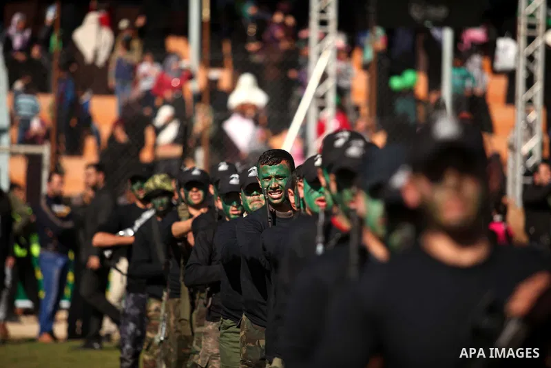 Palestinian youths demonstrate their skills during a graduation ceremony of a military-style camp organized by the Hamas movement in Gaza City on January 29, 2015. Hamas's armed wing organized "Liberation Youths Camps" f...