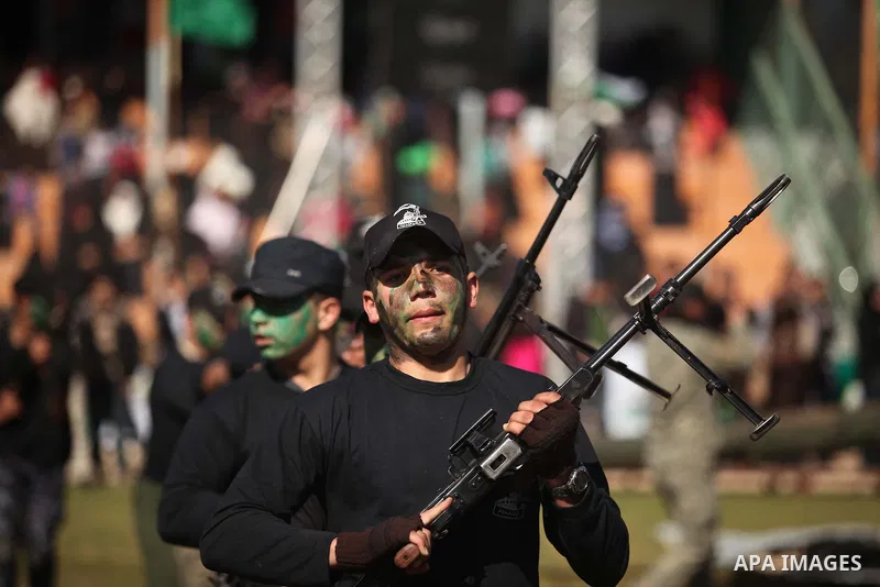 Palestinian youths demonstrate their skills during a graduation ceremony of a military-style camp organized by the Hamas movement in Gaza City on January 29, 2015. Hamas's armed wing organized "Liberation Youths Camps" f...