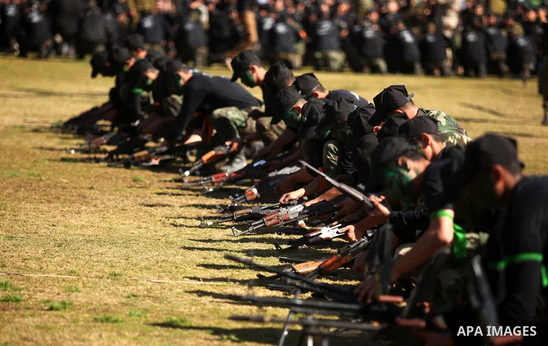 Palestinian youths demonstrate their skills during a graduation ceremony of a military-style camp organized by the Hamas movement in Gaza City on January 29, 2015. Hamas's armed wing organized "Liberation Youths Camps" f...