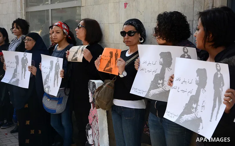 Egyptian women hold placards during a demonstration against the killing of Shaima al-Sabbagh, who was killed during clashes with Egyptian police on January 24, in Cairo on January 29, 2015. Al-Sabbagh was killed in clash...