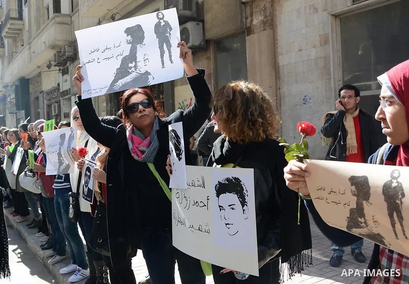Egyptian women hold placards during a demonstration against the killing of Shaima al-Sabbagh, who was killed during clashes with Egyptian police on January 24, in Cairo on January 29, 2015. Al-Sabbagh was killed in clash...