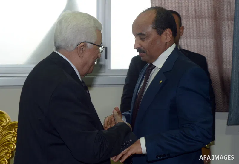 Palestinian President Mahmoud Abbas meets with Mauritanian President Mohamed Ould Abdel Aziz during the opening ceremony of the 24th Ordinary session of the Assembly of Heads of State and Government of the African Union...