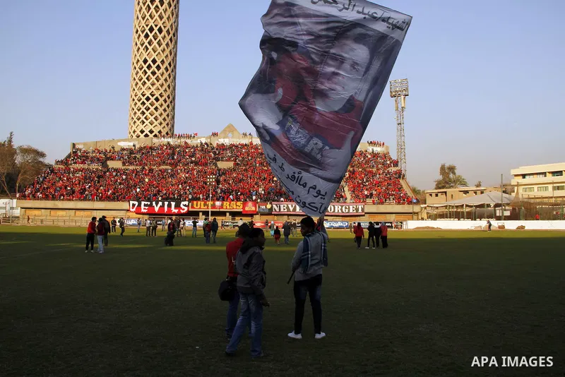 Al Ahly fans, also known as "Ultras", light flares and shout slogans at al-Ahly club's training stadium marking the third anniversary of killing al-Ahly fans in what known as the "Port Said massacre", on February 1, 2015...