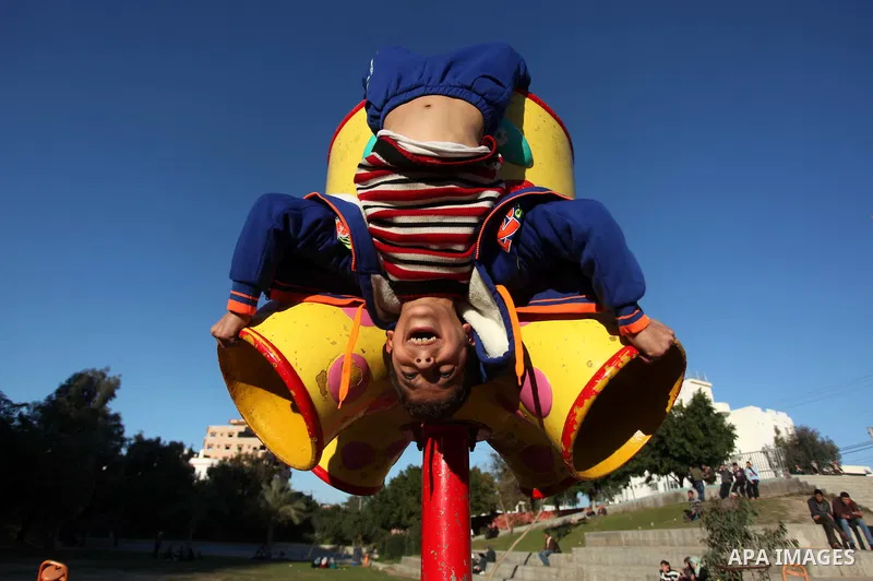 Mohammed El-sheikh, a 11-year-old Palestinian boy, demonstrates his skills at a garden, in Gaza city on February 3, 2015. El-sheikh is a extremely flexible young, who’s been training for only a year without any professio...