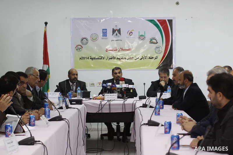 Palestinian Deputy of the Ministry of National Economy in Gaza strip Hatem Eweida speaks during a press conference in the Gaza Strip, in February 3, 2015. Photo by Mohammed Asad