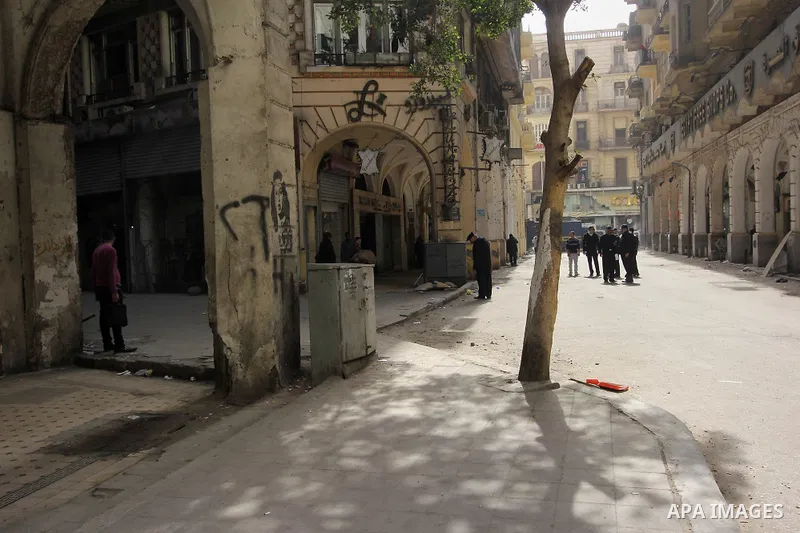 Egyptian soldiers stand guard on the blast site in downtown Cairo, Egypt, Feb. 3, 2015. A blast occurred at Talaat Harb square in downtown Cairo, leaving no casualties, an official source at Cairo Security Directorate wa...