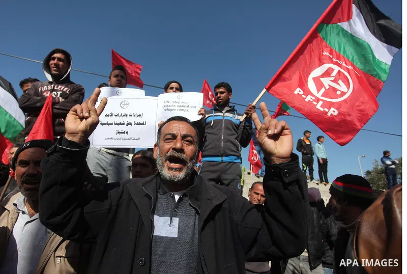 Palestinian supporters of the Popular Front for the Liberation of Palestine (PFLP) take part a protest in front of the headquarters of the United Nations in Gaza city on February 3, 2015 after the UN announced a lack of...