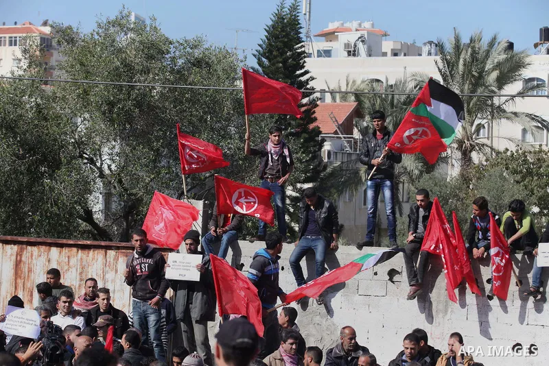 Palestinian supporters of the Popular Front for the Liberation of Palestine (PFLP) take part a protest in front of the headquarters of the United Nations in Gaza city on February 3, 2015 after the UN announced a lack of...