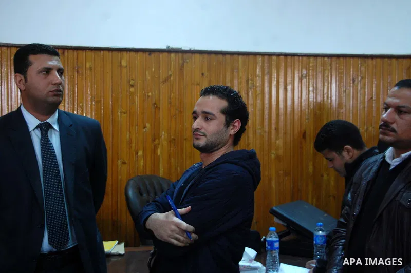 Egyptian political activist Ahmed Douma attends his trial in Cairo, February 4, 2015. An Egyptian court sentenced prominent activist Douma to life in prison on Wednesday, judicial sources said, part of a sustained crackd...