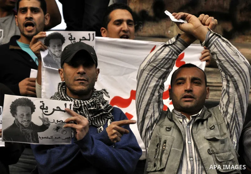 Egyptian journalists and photo-journalists take part in a protest in front of their syndicate in Cairo on February 4, 2015, to demand the release of their detained colleagues. Since the army ousted Islamist president Moh...