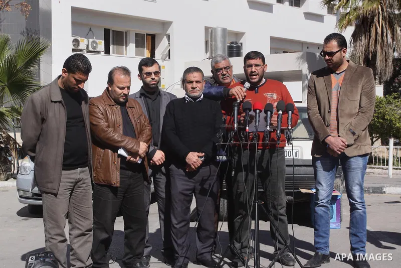 Palestinian spokesman of the cleaning companies, Ahmed El-Hindi, speaks during a press conference, in Gaza city February 5, 2015. Photo by Mohammed Asad