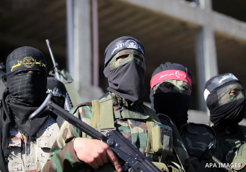Representatives of various Palestinian armed factions take part in a news conference to condemn the decision of an Egyptian court that banned Hamas' armed wing, in Gaza City February 5, 2015. An Egyptian court last week...