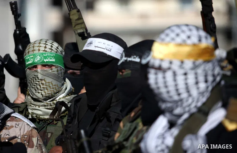 Representatives of various Palestinian armed factions take part in a news conference to condemn the decision of an Egyptian court that banned Hamas' armed wing, in Gaza City February 5, 2015. An Egyptian court last week...