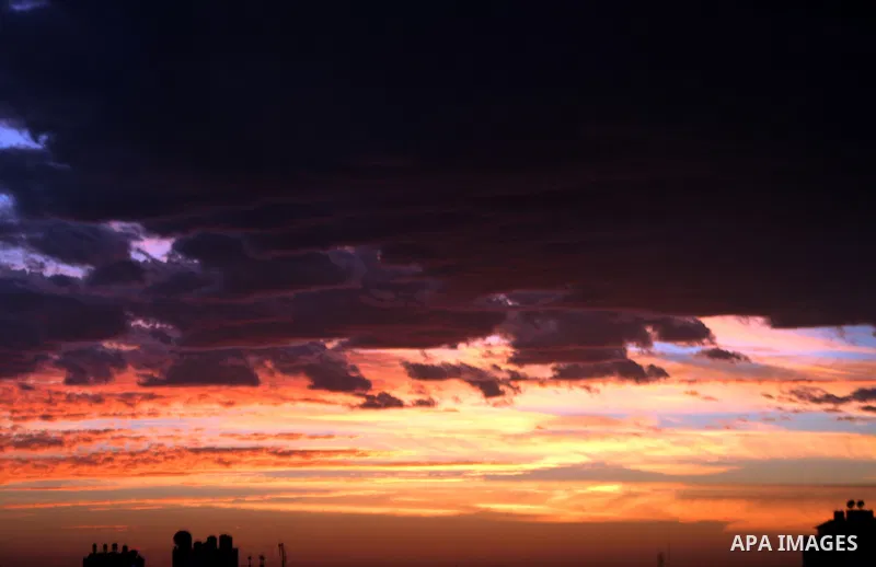 Sunset is seen over Rafah city, in the southern Gaza Strip, February 6, 2015. Photo by Abed Rahim Khatib