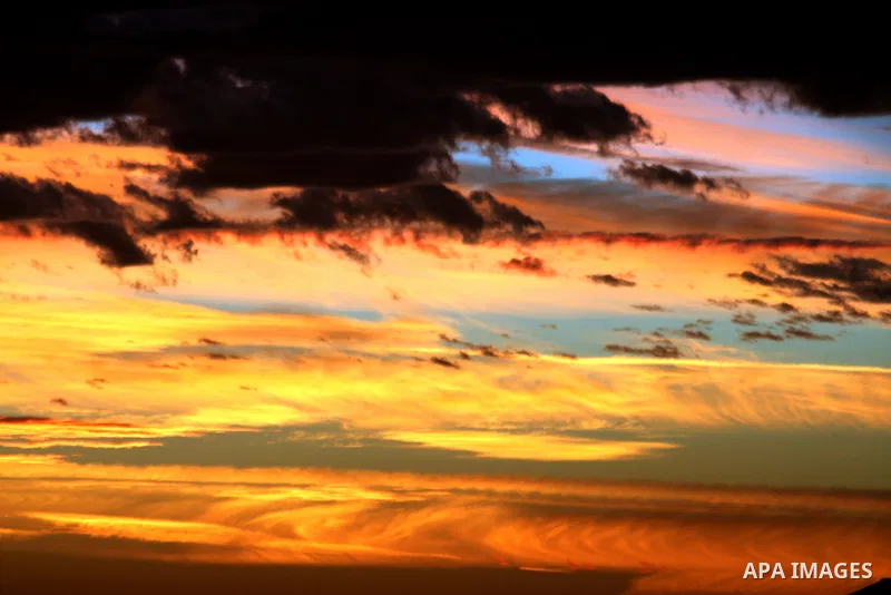 Sunset is seen over Rafah city, in the southern Gaza Strip, February 6, 2015. Photo by Abed Rahim Khatib