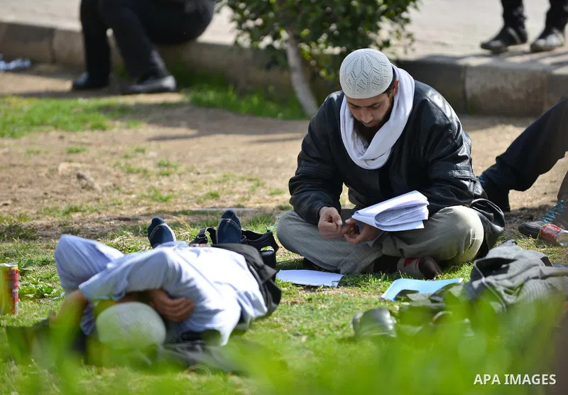 An Egyptian student studies at the cairo University during the first day of the second term of the 2014-15 academic year on February 7, 2015. Due to the escalation of students protest in the campus of several universitie...