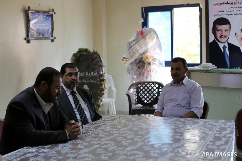 Leaders of Hamas movement Fathi Hammad (L) and Basem Naiem (C), visit the Jordanian hospital to mourning Jordanian pilot Muath al-Kasaesbeh, in Gaza city on February 8, 2015. Photo by Mohammed Asad