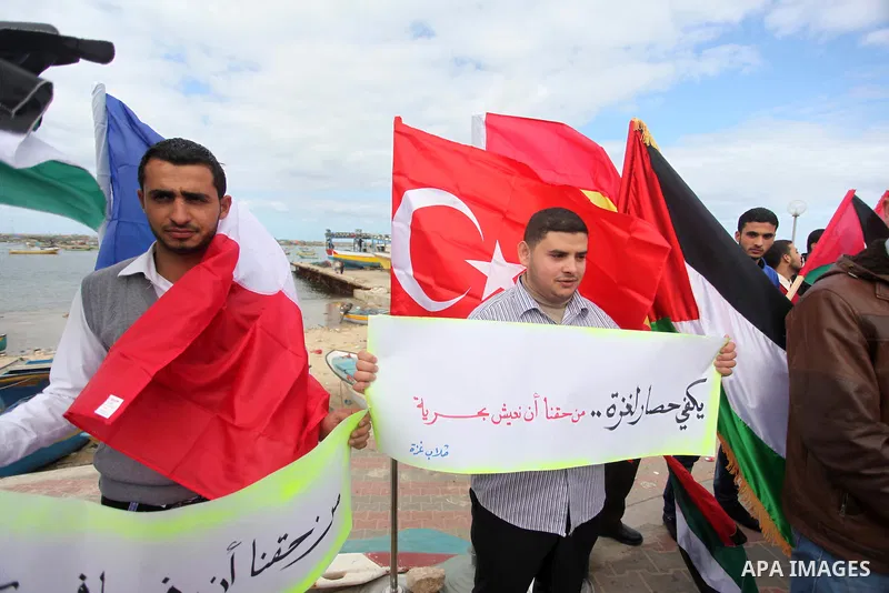 Palestinian students take part in a protest demanding for the opening of a waterway between Gaza Strip and other countries, at the Gaza seaport on February 8, 2015. The governmental Committee to Break the Siege on Gaza d...