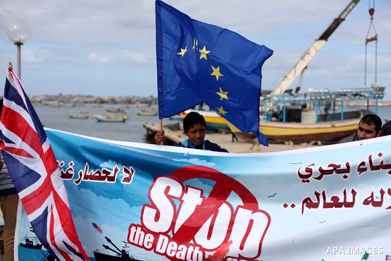 Palestinian students take part in a protest demanding for the opening of a waterway between Gaza Strip and other countries, at the Gaza seaport on February 8, 2015. The governmental Committee to Break the Siege on Gaza d...