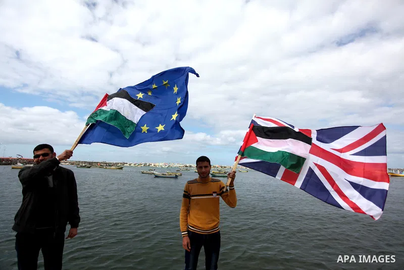 Palestinian students take part in a protest demanding for the opening of a waterway between Gaza Strip and other countries, at the Gaza seaport on February 8, 2015. The governmental Committee to Break the Siege on Gaza d...