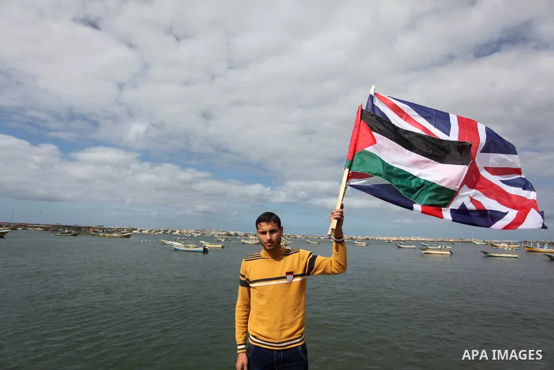 Palestinian students take part in a protest demanding for the opening of a waterway between Gaza Strip and other countries, at the Gaza seaport on February 8, 2015. The governmental Committee to Break the Siege on Gaza d...