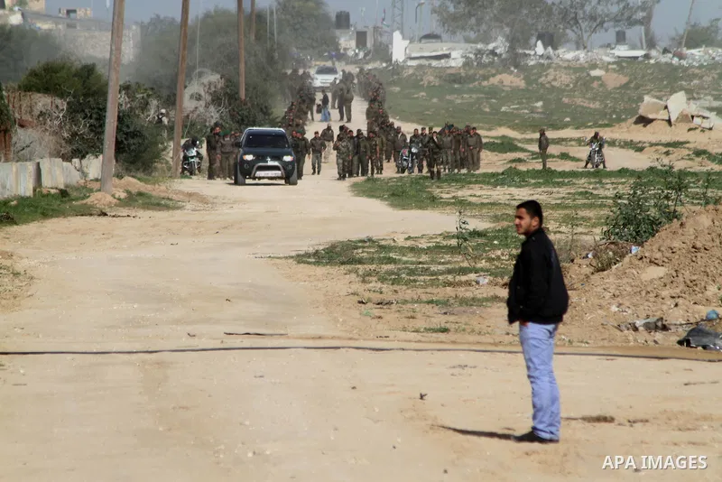Members of Palestinian security forces loyal to Hamas patrol on the border between Egypt and southern Gaza Strip February 10, 2015. Photo by Abed Rahim Khatib