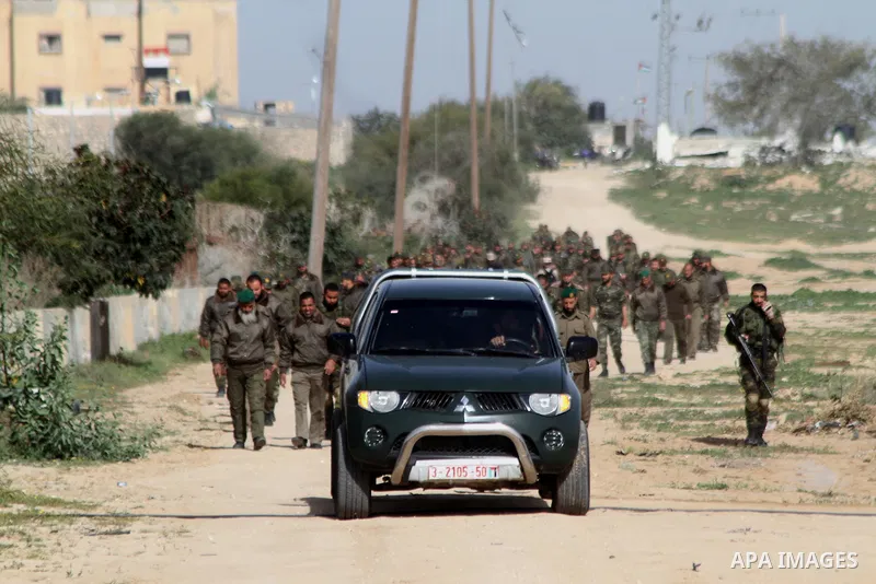 Members of Palestinian security forces loyal to Hamas patrol on the border between Egypt and southern Gaza Strip February 10, 2015. Photo by Abed Rahim Khatib