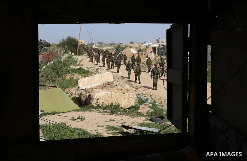 Members of Palestinian security forces loyal to Hamas patrol on the border between Egypt and southern Gaza Strip February 10, 2015. Photo by Abed Rahim Khatib