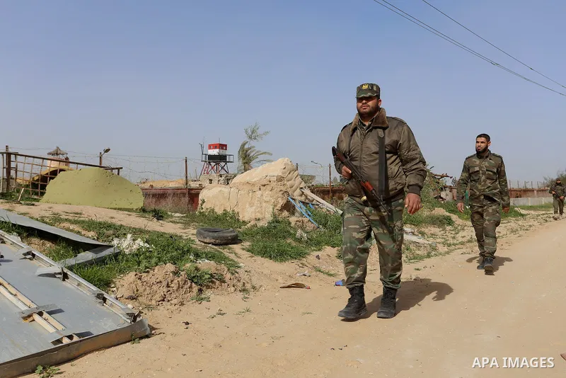 Members of Palestinian security forces loyal to Hamas patrol on the border between Egypt and southern Gaza Strip February 10, 2015. Photo by Abed Rahim Khatib