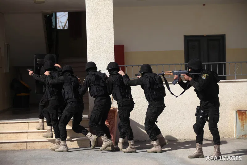 Members of the Palestinian presidential guard demonstrate their skills during a training session in the West Bank city of Jericho February 10, 2015. Photo by Shadi Hatem