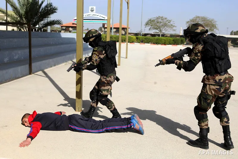 Female members of the Palestinian presidential guard demonstrate their skills during a training session in the West Bank city of Jericho February 10, 2015. Photo by Shadi Hatem