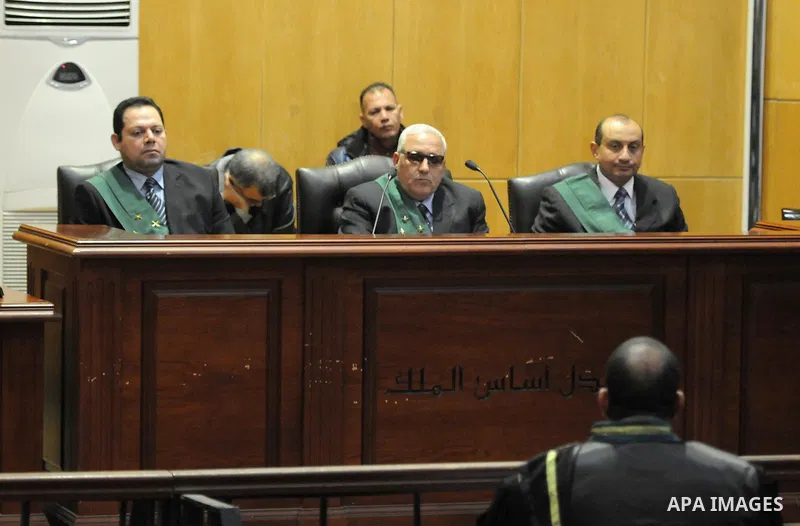 A lawyer speaks to judges during the trial of suspects in the 'Port Said Massacre' case in Cairo on February 10, 2015. The defendants were originally given sentences ranging from 15 years to life in prison. They were con...
