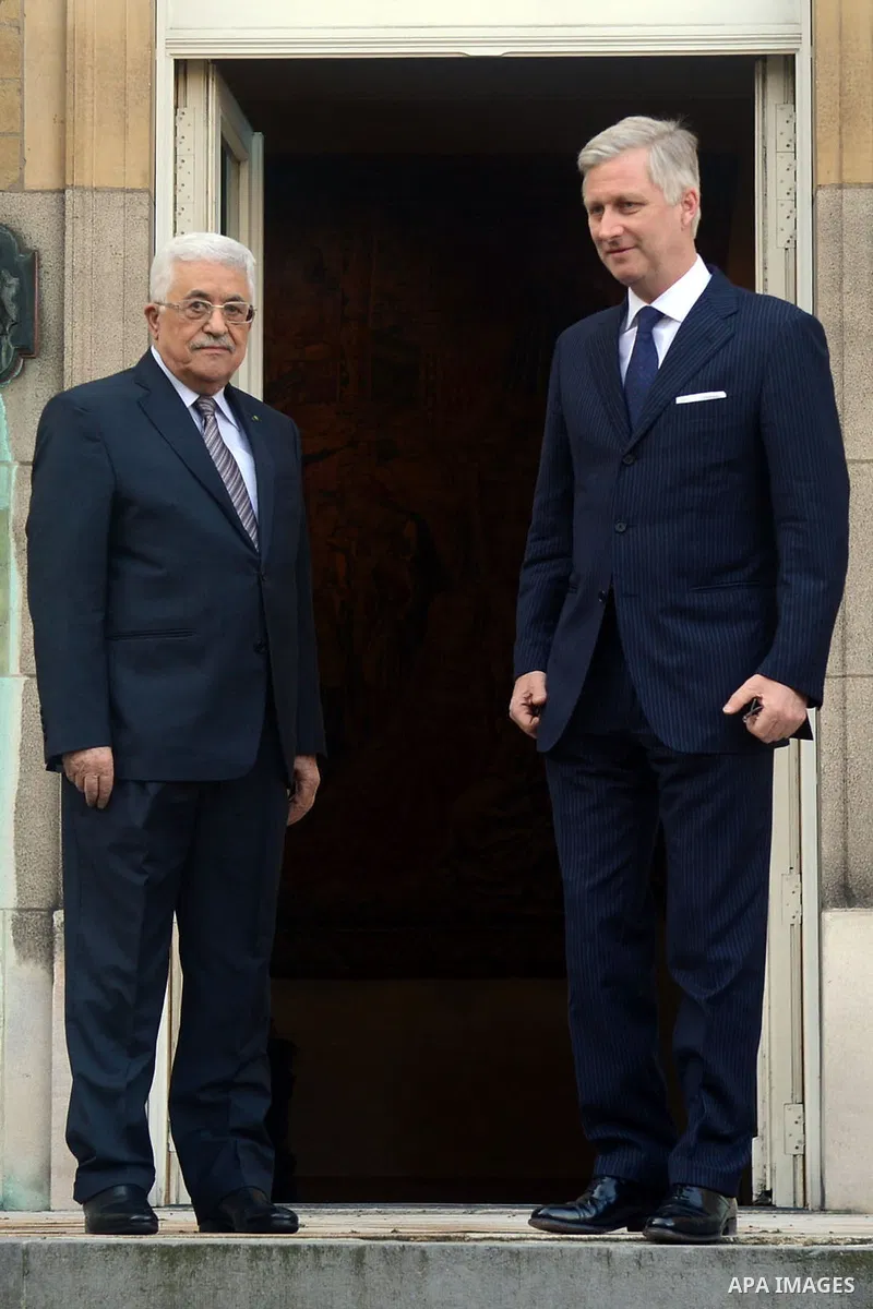 Palestinian president Mahmoud Abbas (L) is welcomed by King Philippe - Filip of Belgium prior to a bilateral meeting on February 12, 2015, at the Royal Palace in Brussels. Photo by Thaer Ganaim