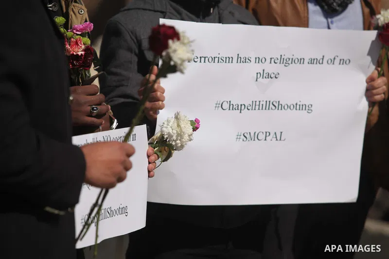 Palestinians gather to remember the Chapel Hill shooting victims, the three young Muslims who were gunned down in North Carolina this week, in Gaza City, February 14, 2015. Newlywed Deah Shaddy Barakat, 23, a University...