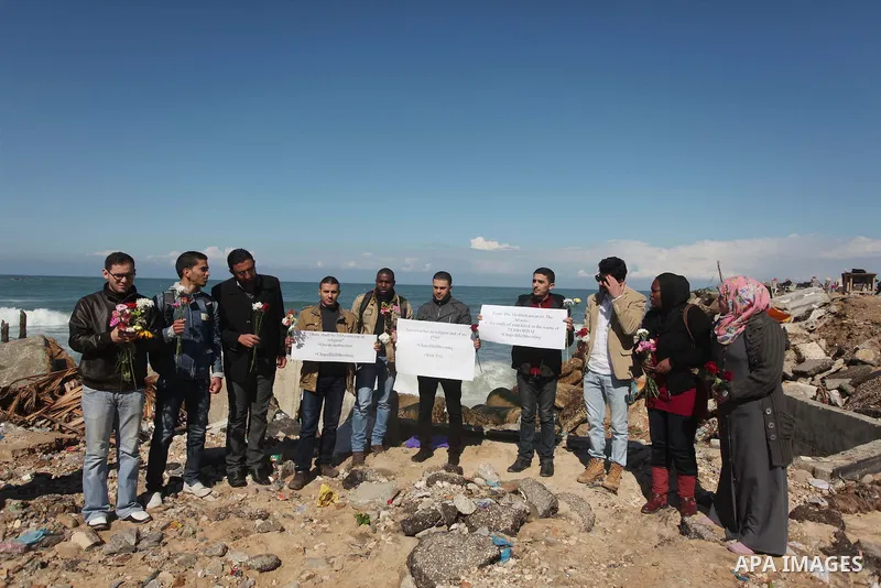 Palestinians gather to remember the Chapel Hill shooting victims, the three young Muslims who were gunned down in North Carolina this week, in Gaza City, February 14, 2015. Newlywed Deah Shaddy Barakat, 23, a University...