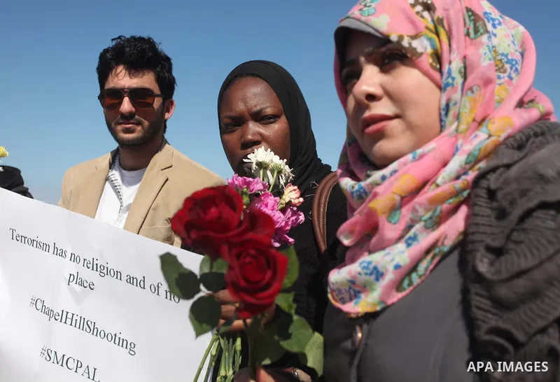 Palestinians gather to remember the Chapel Hill shooting victims, the three young Muslims who were gunned down in North Carolina this week, in Gaza City, February 14, 2015. Newlywed Deah Shaddy Barakat, 23, a University...